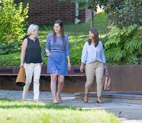 Three dental team members in the community