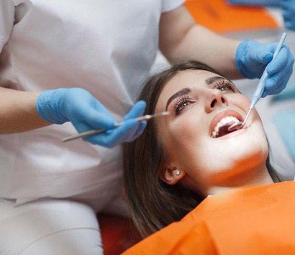 patient getting dental checkup in North Bethesda