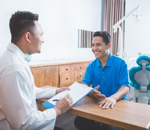 dentist in North Bethesda explaining financing options