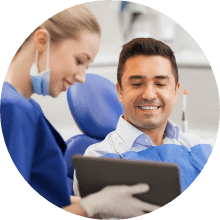 Dentist and patient discussing restorative dentistry options