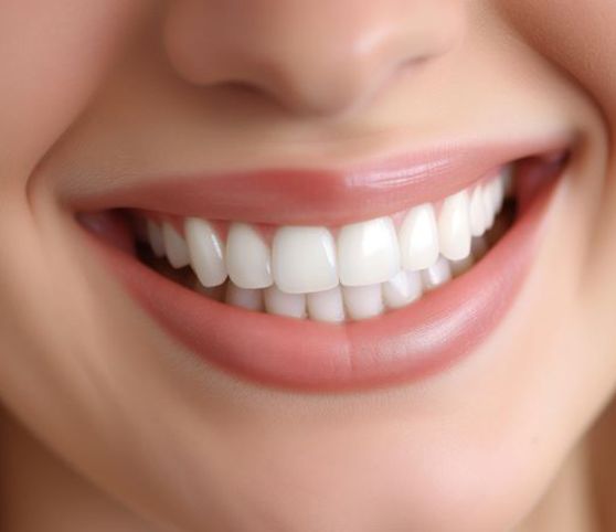 Close-up of woman’s smile with healthy teeth and gums